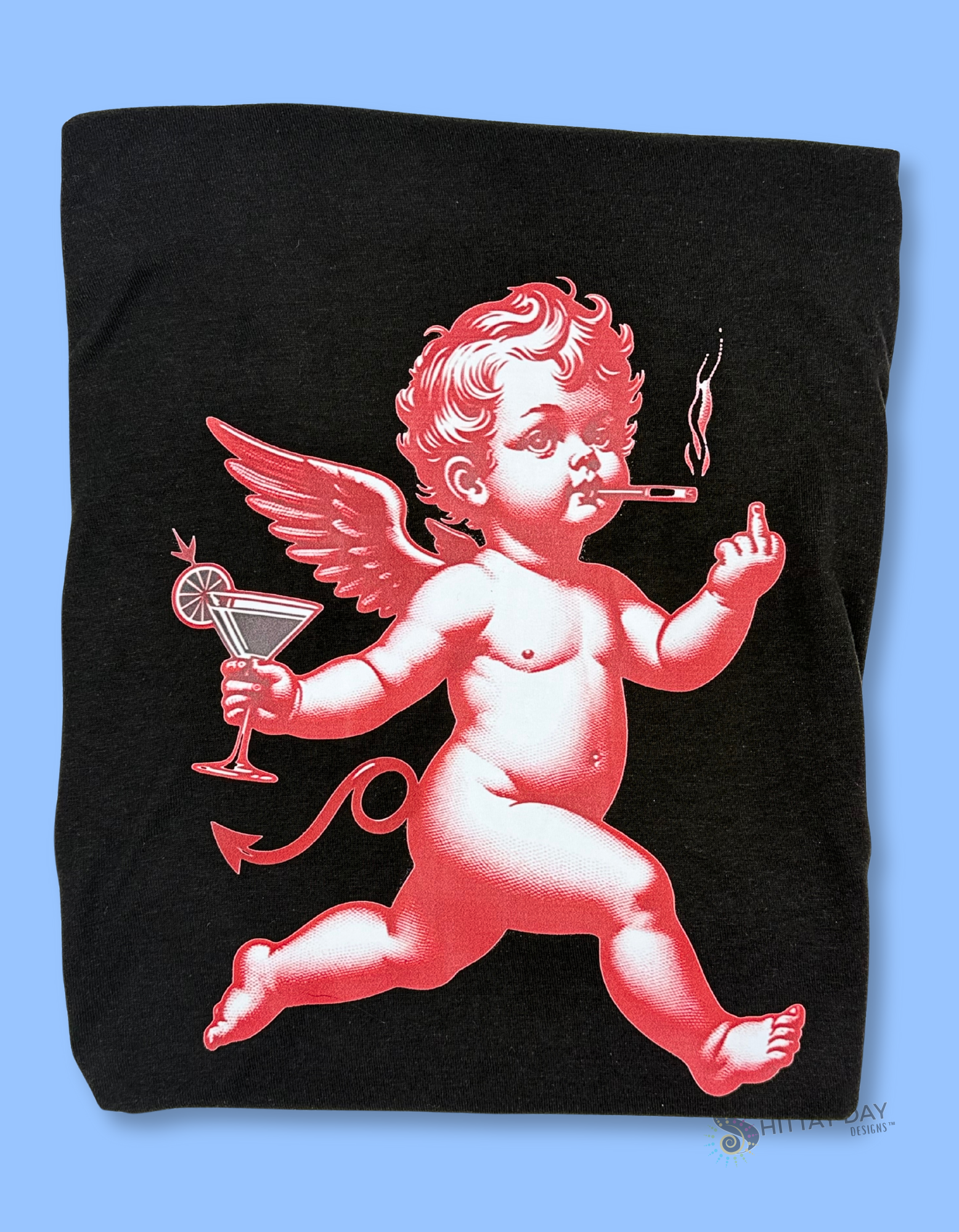 Black t-shirt with a red cherub smoking a cigarette, holding a martini glass, and flashing a middle finger design on a blue background.
