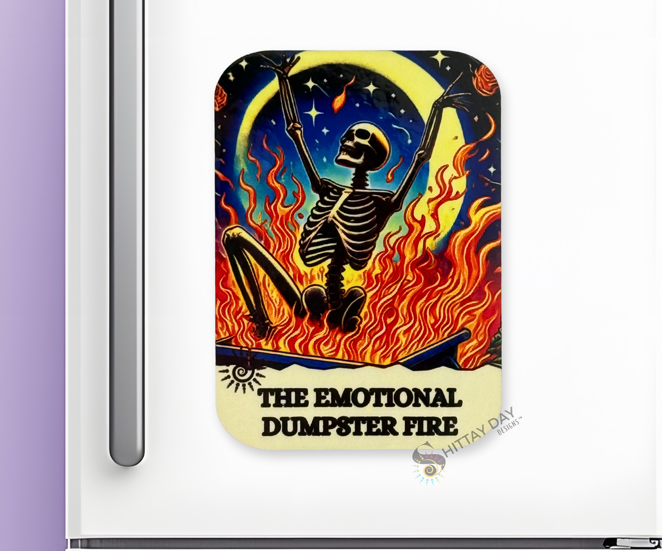 Skeletal design magnet with flames and "The emotional dumpster fire" text on a colorful background