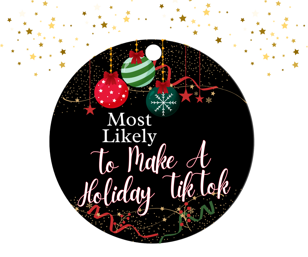 Round black ornament with red, green, and gold Christmas decorations featuring the humorous text 'Most Likely To Make A Holiday TikTok'.