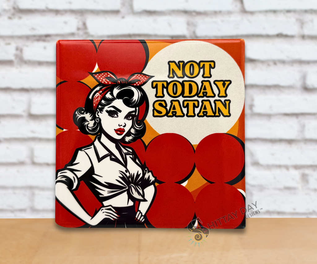 Ceramic coaster with a graphic illustration of a woman and the words 'Not Today Satan' text on a red background.