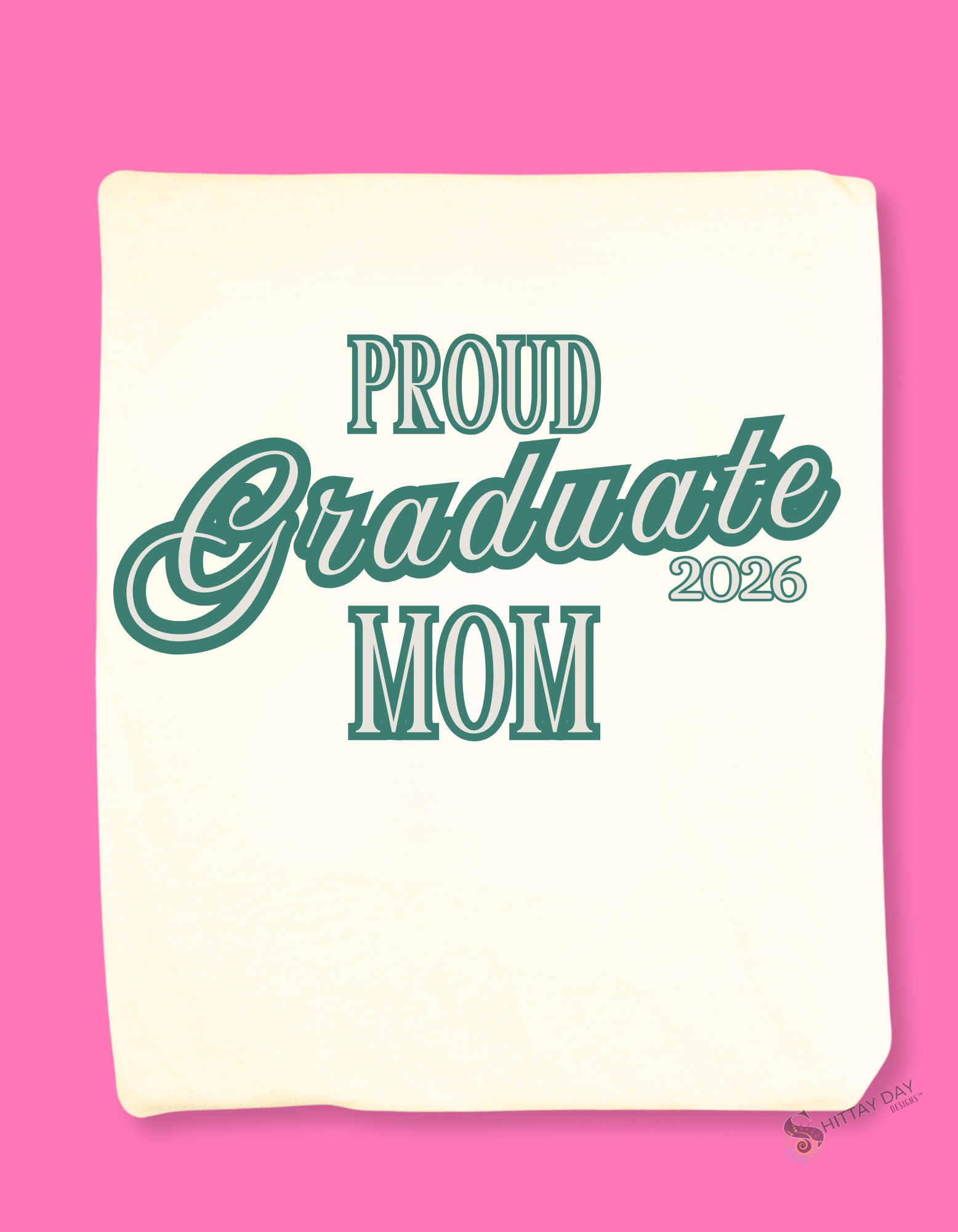 Natural color folded tshirt with a close up of the design; 'Proud Graduate Mom 2026'  teal text. Merchandised on a pink background.