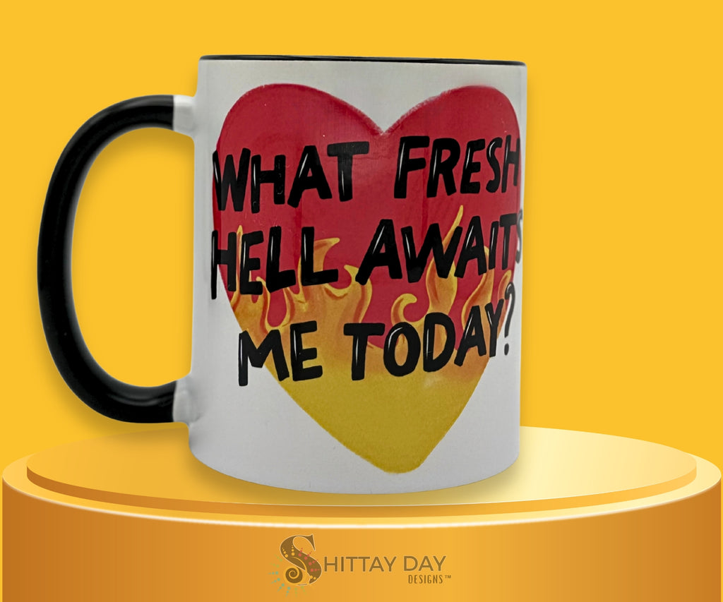 What Fresh Hell Awaits Me Today 11.8 oz black-and-white two-tone ceramic mug with a vibrant flaming heart design.
