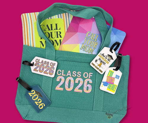 Sea Foam green tote bag with 'Class of 2026' text and matching  luggage tags and mouse pads merchandised on a hot pink background